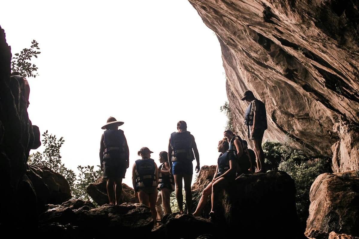 Cave explorers in Vietnam with backpacks