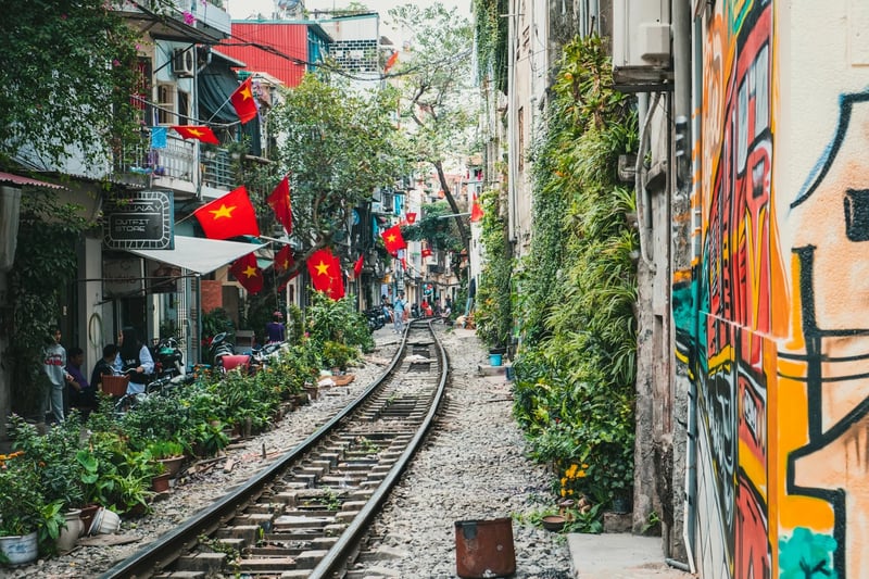Narrow alleyway with train track